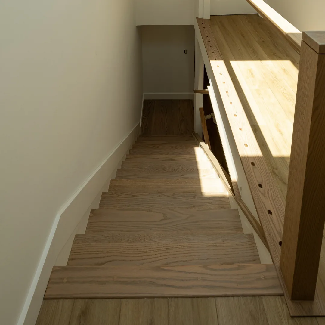 Newly installed hardwood staircase and landing