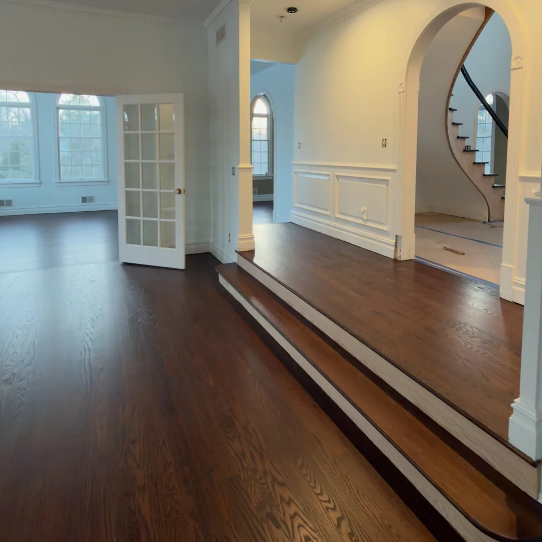 Newly installed dark hardwood floors in elegant home