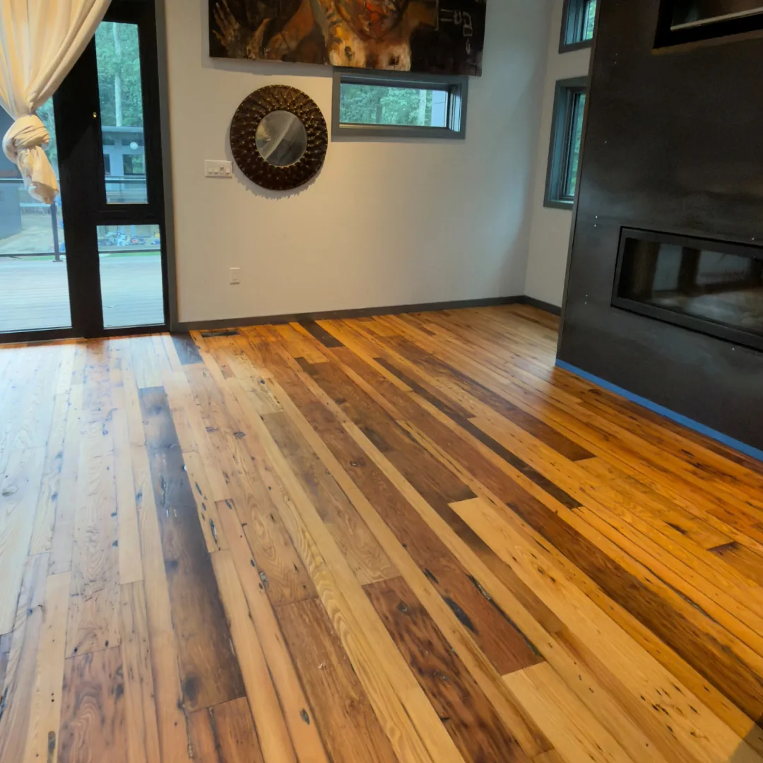 Newly installed hardwood floor in modern room.