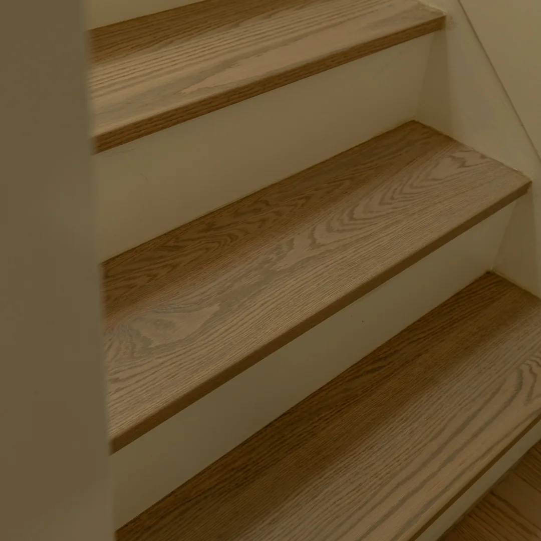 Close-up of newly installed wooden staircase treads